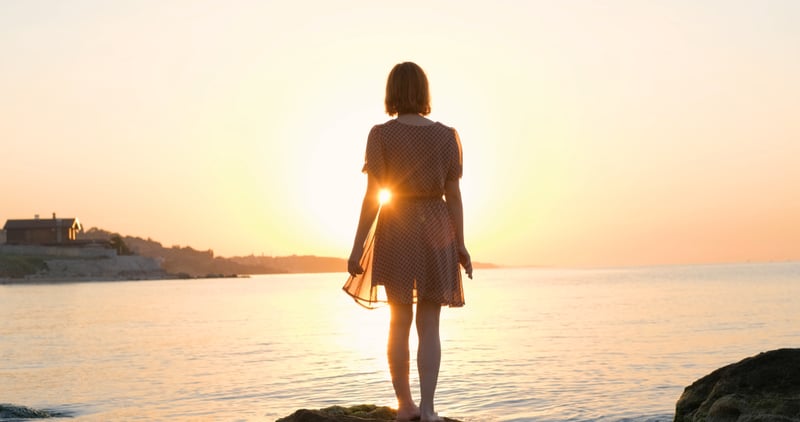 Young woman relaxing on summer beach